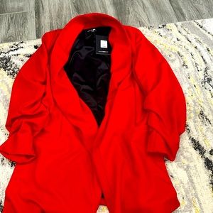 Fashion nova blazer with tags size large . This can be dress up or down .